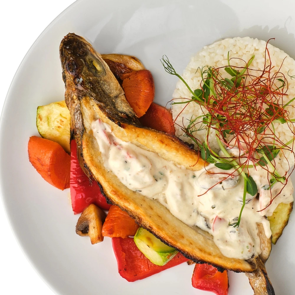 Seabass stuffed with seafood with steamed rice