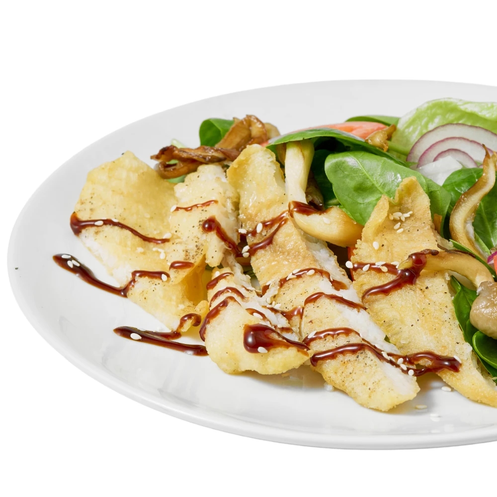 Mixed salad with baked fish