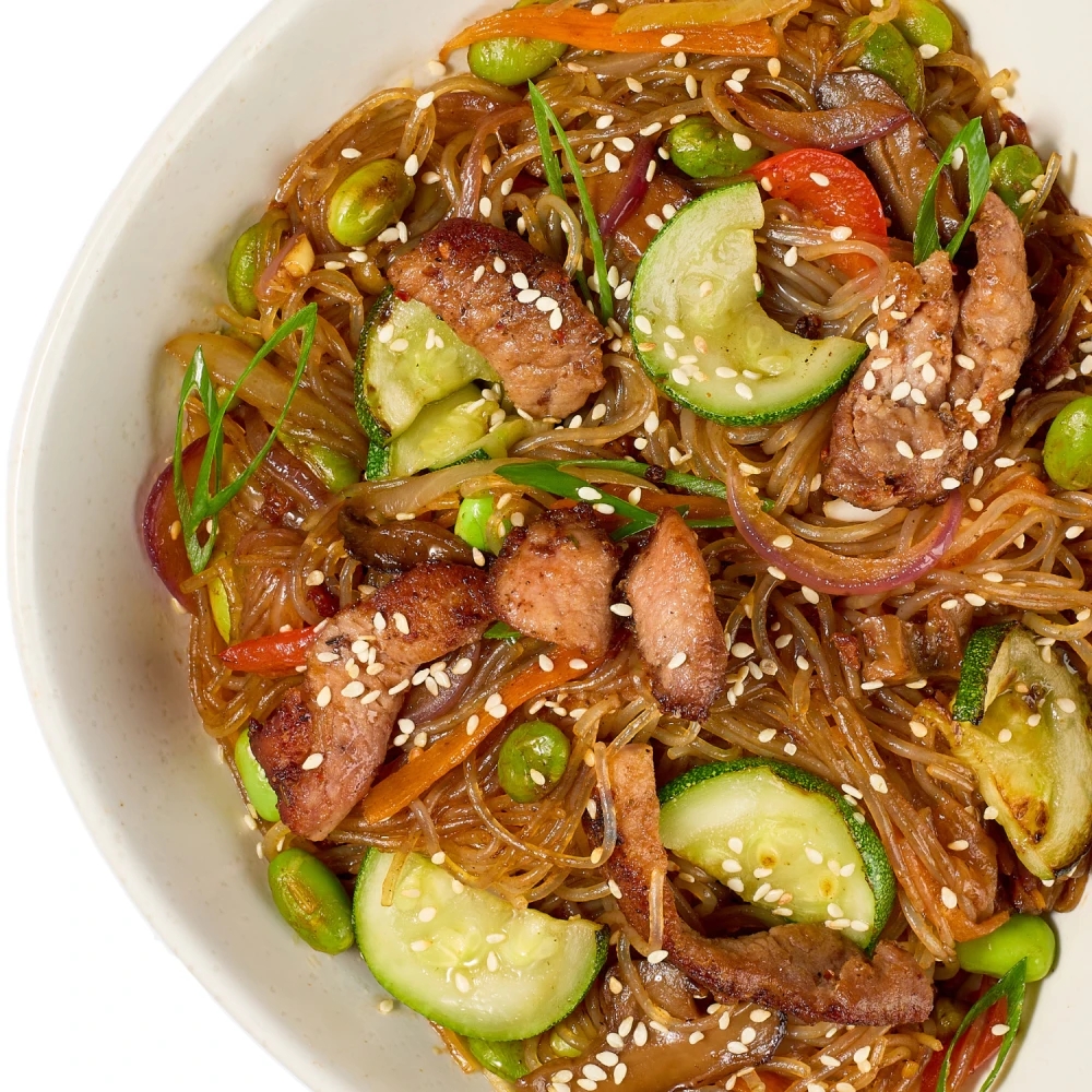 Glass wok with chicken
